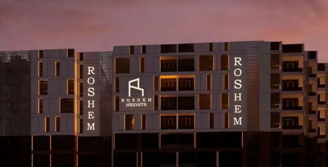 Roshem Heights – building exterior at night
